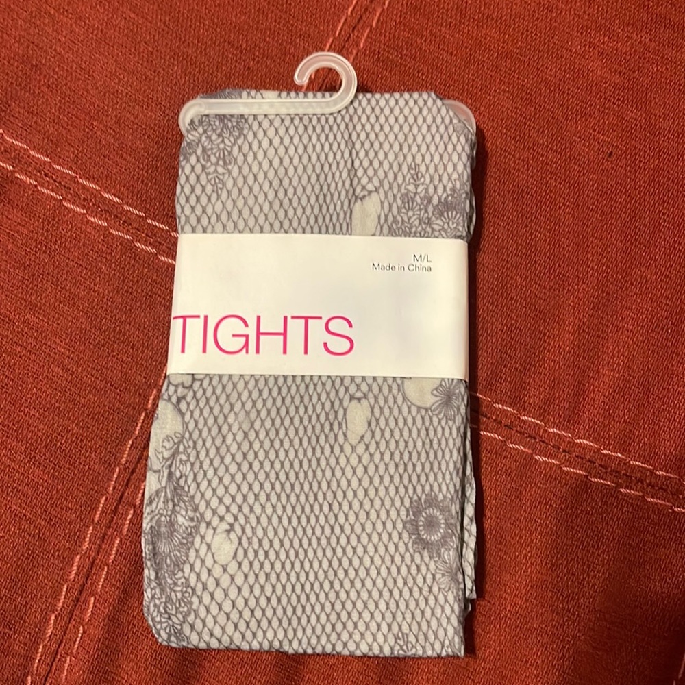Gray tights with fishnet-like pattern with flowers